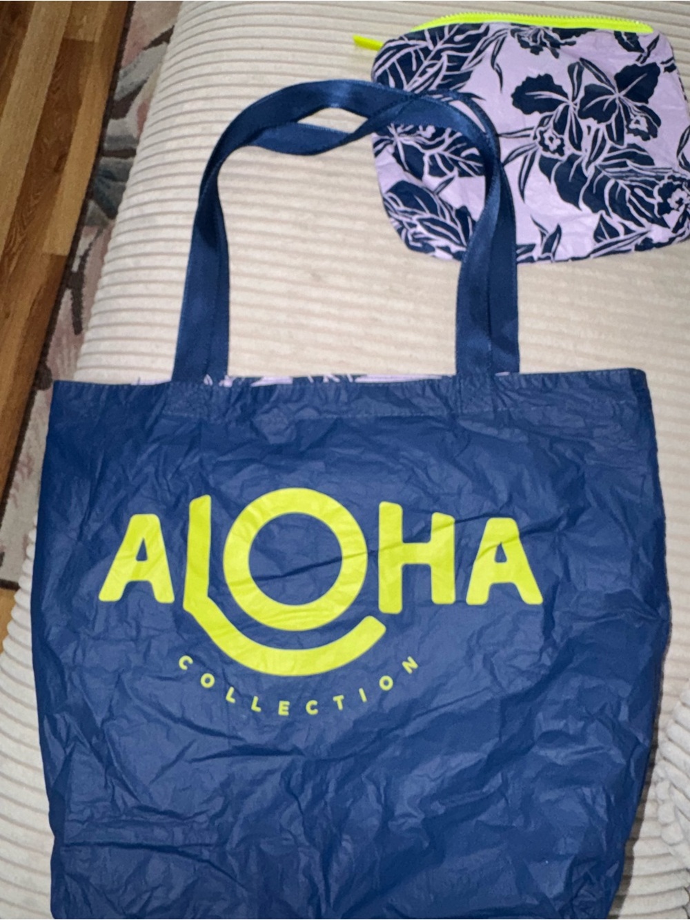 ALOHA Collection reversible navy tote with lime logo and matching pouch